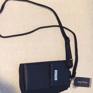 Nautica Wallet with detachable strap.